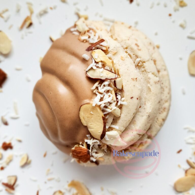 Coconut pecan chocolate dipped concha by Bakescapade, who uses Darigold butter and milk in their pan dulces. Photo courtesy of Bakescapade.