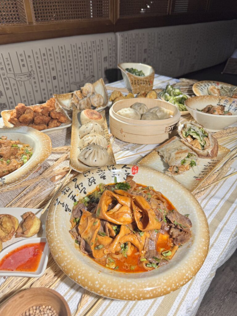 Full spread at Dumpling the Noodle.