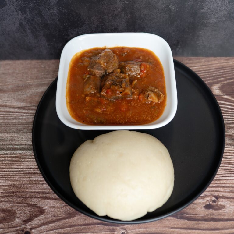 Ku Mana's Authentic Burundian Cuisine offers goat stew with cassava fufu, a traditional favorite. Photo by @frantzvisuals.