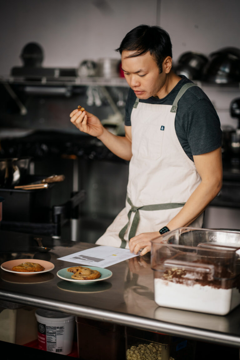 Vince Vu of Anh Ơi Bake Shop shares his shelves with local Asian American bakers and makers, creating a space built around food, culture, and community. Photo by Dougal Brownlie, Brownlie Creative.