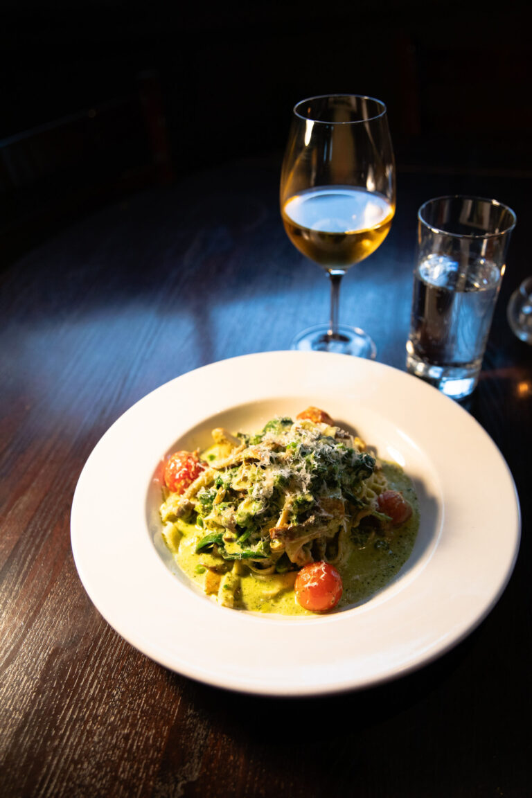 House made egg Fettuccine tossed with wild mushrooms, English peas, fresh tomatoes and spinach on Volterra's fall Seattle Restaurant Week menu. Photo by Mackenzie Grace Photography.