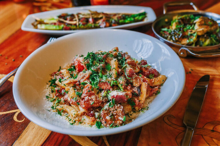 Join Toulouse Petit for their special menu, explore a glass from their wine list, and bring your friends. Photo by Nerissa Noel Portraiture.