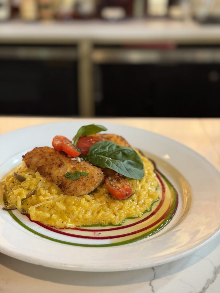 Pink Salt's Pescado ahumado with risotto using seafood from Wild Salmon Seafood Market at Fishermen's Terminal. Photo by Eve LeMarque.